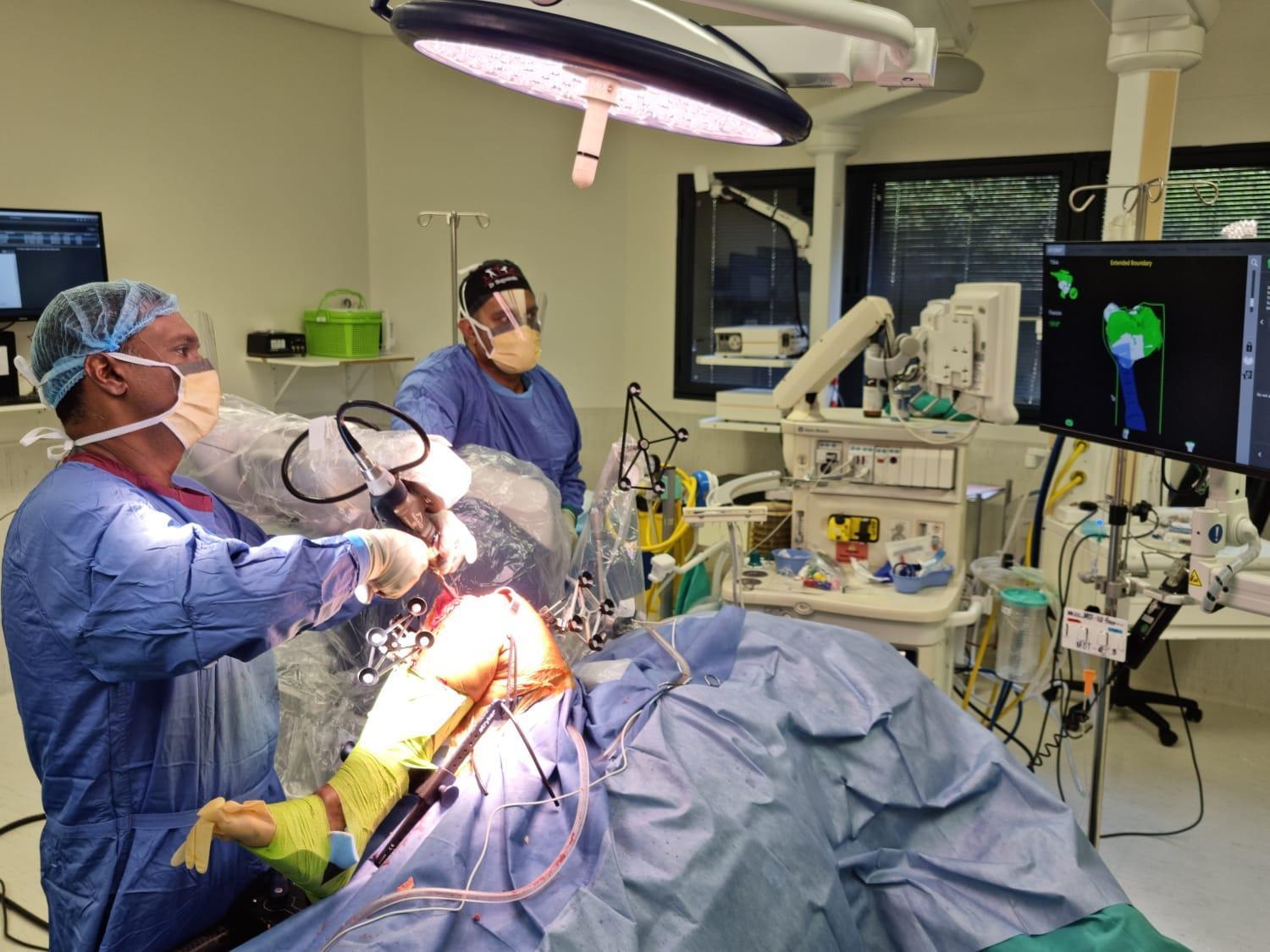 doctors performing surgery