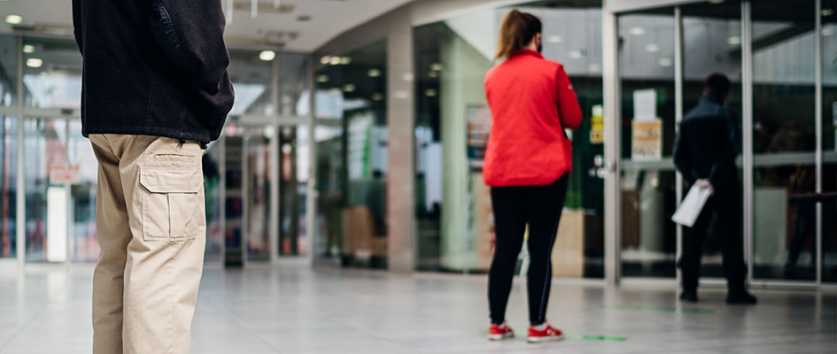 woman long-distance standing in queue