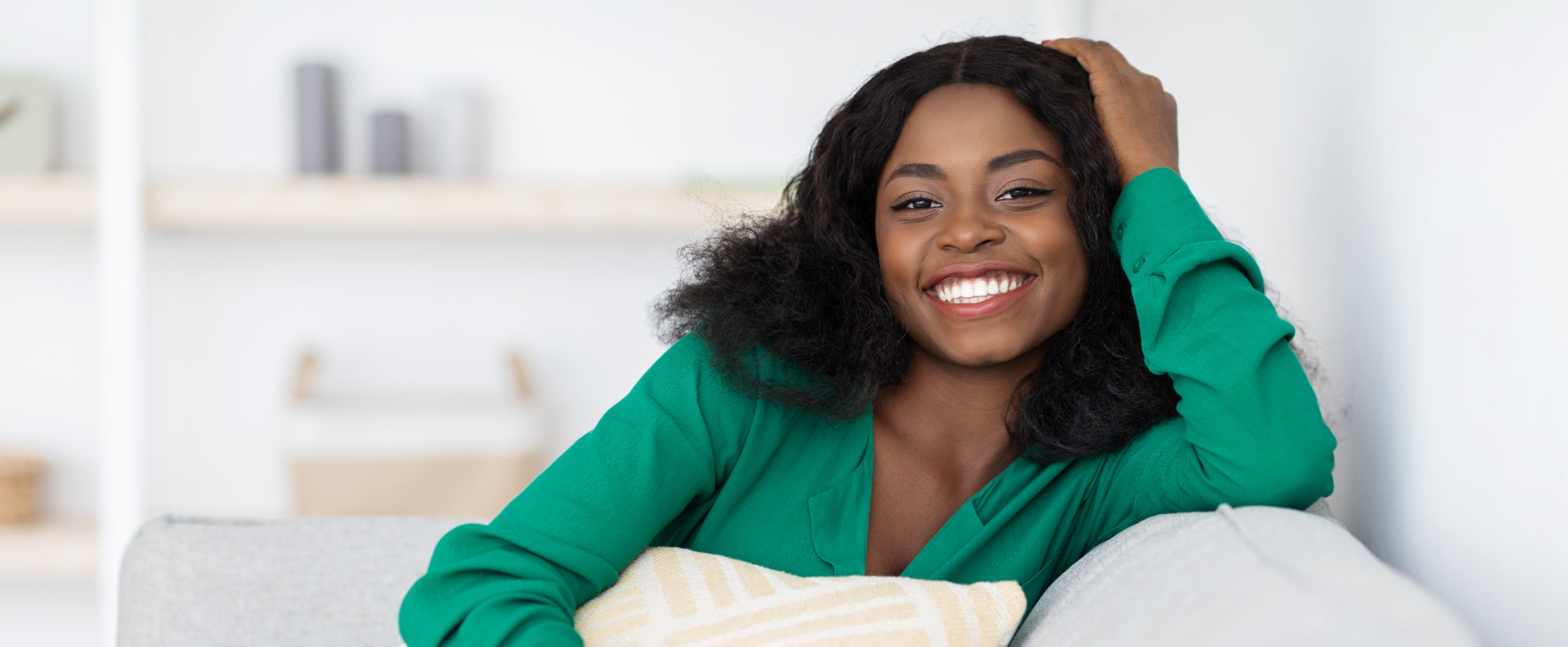 Smiling pretty african american millennial woman